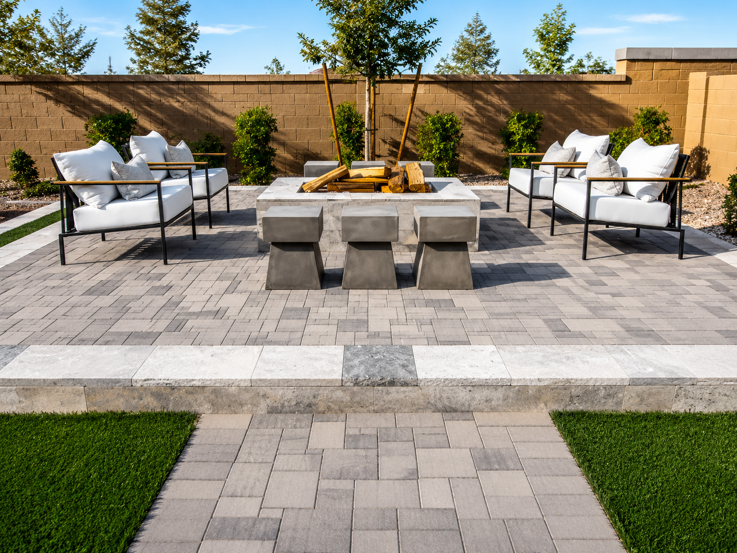 Modern Bee Cave outdoor lounge with stone fireplace, cantilever umbrella, and pool